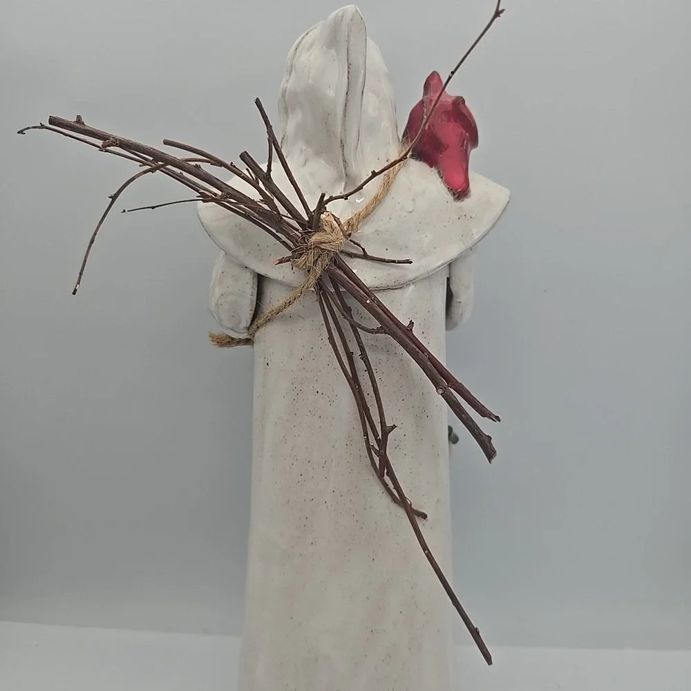 Tall White Coat Santa‎ Holding Cardinals And Bird Nest
